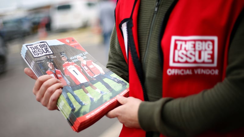 Vendor selling The Big Issue (Paul Harding/PA)