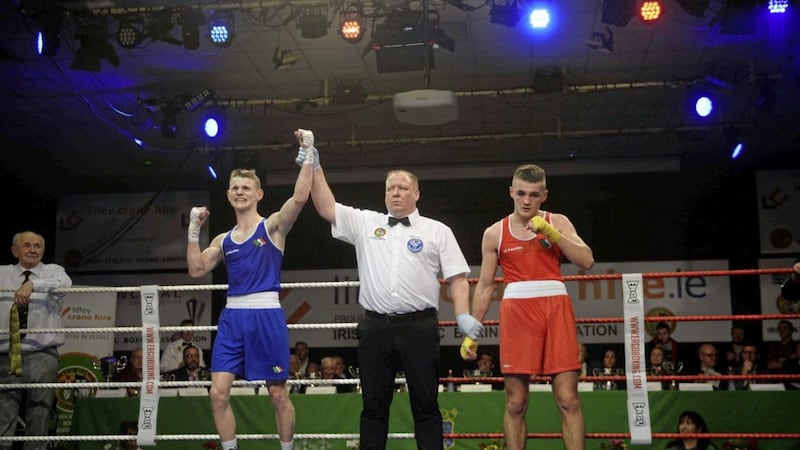 Brandon McCarthy has his hand raised after defeating Belfast&#39;s Barry McReynold&#39;s in last night&#39;s lightweight decider at the Irish Elite Championships. Picture by Mark Marlow 
