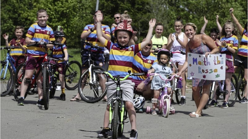 Rossa Doherty (6) completes his 31-day cycle challenge around the Falls Park, raising &pound;2,500 for the NI Hospice. Picture by Hugh Russell 