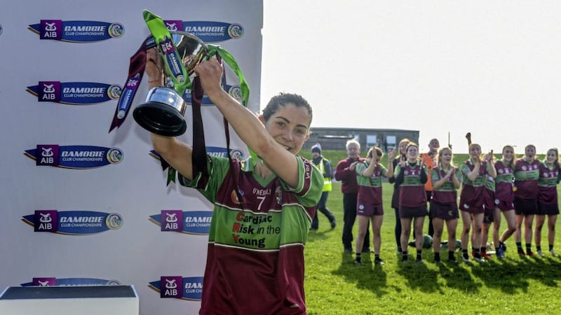 Eoghan Rua&#39;s Ellis McNamee lifts the trophy after their win over Clanmaurice in the AIB All-Ireland Junior Club Camogie Championship final at O&#39;Raghallaighs GAC, Drogheda Picture: Cathal McOscar/Inpho 