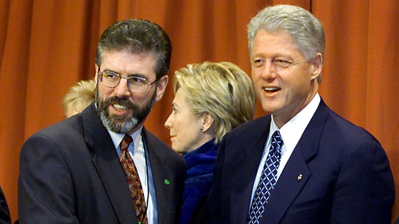File photo dated 12/12/2000 of American President Bill Clinton (right) greeting Sinn F&eacute;in President Gerry Adams at the Guinness Storehouse in Dublin&nbsp;