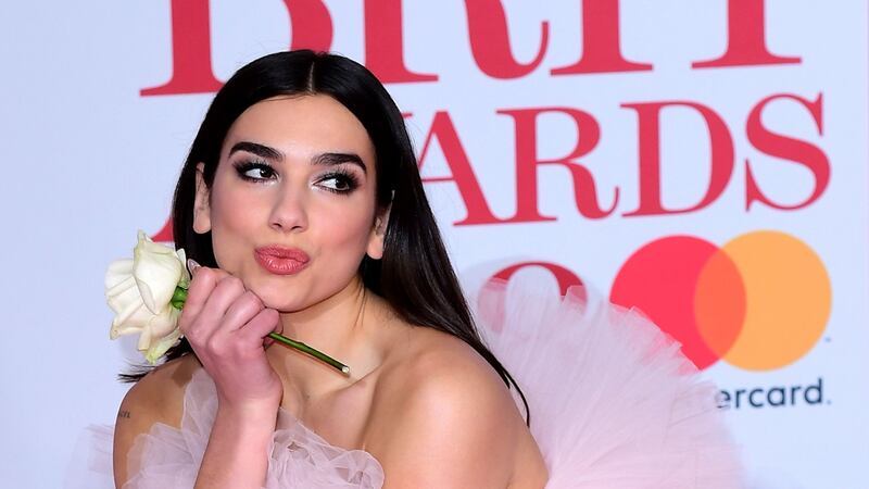 Dua Lipa was one of the first to arrive on the red carpet.