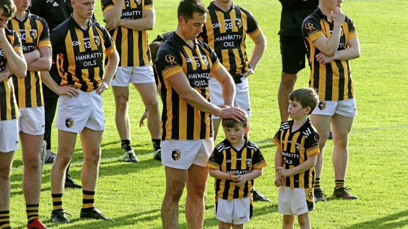Crossmaglen stalwart Aaron Kernan with his sons after last year&#39;s county final defeat to Maghery. Picture by Seamus Loughran 