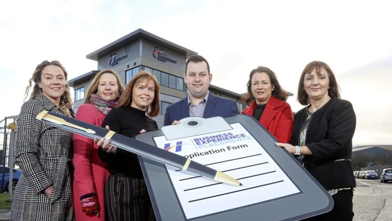 Glen Young , talent acquisition specialist at Henderson Group, with a number of partners from Northern Ireland universities as they launch the Henderson Group&rsquo;s business experience placements. From left: Chrisanne English and Dr Lynsey Quinn, Open University; Adele Dallas, Cafre Loughry Campus; Jill McGrath, Queen&rsquo;s University; and Maria Curran, Ulster University 