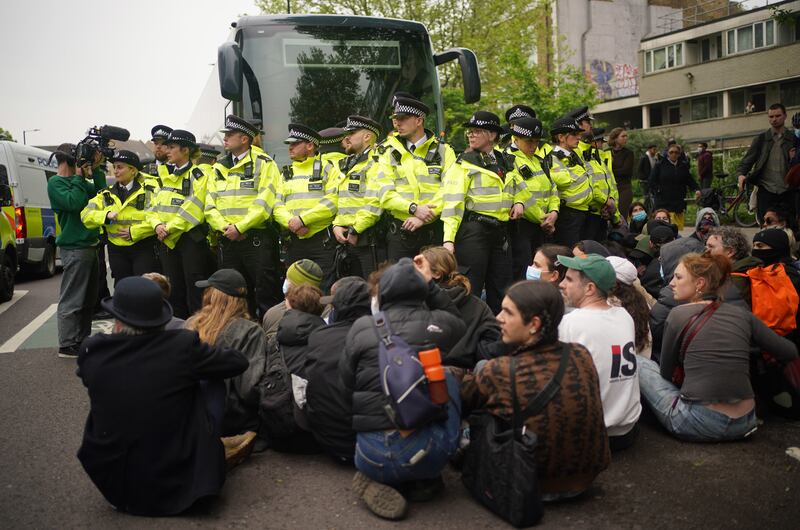 Protesters formed a blockade around the coach which was set to take asylum seekers to the Bibby Stockholm barge