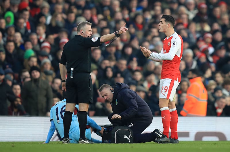 <strong>&nbsp;Marching Orders:&nbsp;</strong>Arsenal's Granit Xhaka was dismissed after his challenge on&nbsp;Burnley's Steven Defour (left)
