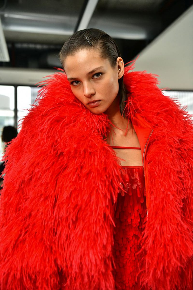 Model wearing red trend, David Koma