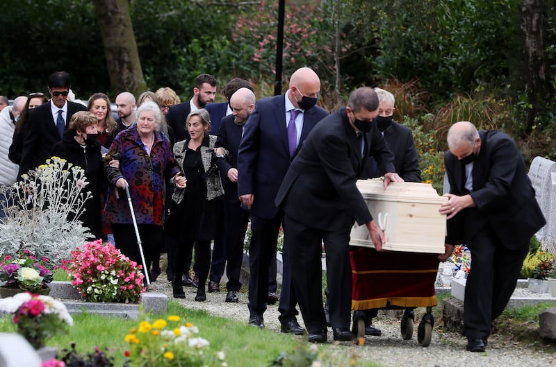 Rita O'Reilly (second left carrying stick) wife of Chieftains founder Paddy Moloney follows his coffin from St Kevin's Church in Glendalough, Co Wicklow, during his funeral. Picture by Brian Lawless/PA Wire&nbsp;