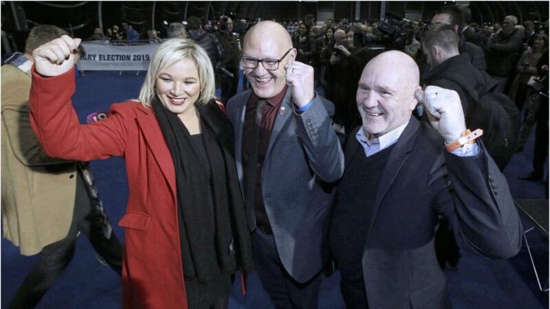 Paul Maskey (centre) celebrating with Michelle O&#39;Neill and his brother, Alex Maskey after retaining the west Belfast Westminster seat. Picture: Hugh Russell 