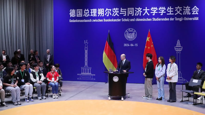 German Chancellor Olaf Scholz talks to students at Tongji University’s Jiading Campus in Shanghai, China (Fang Zhe/Xinhua via AP)