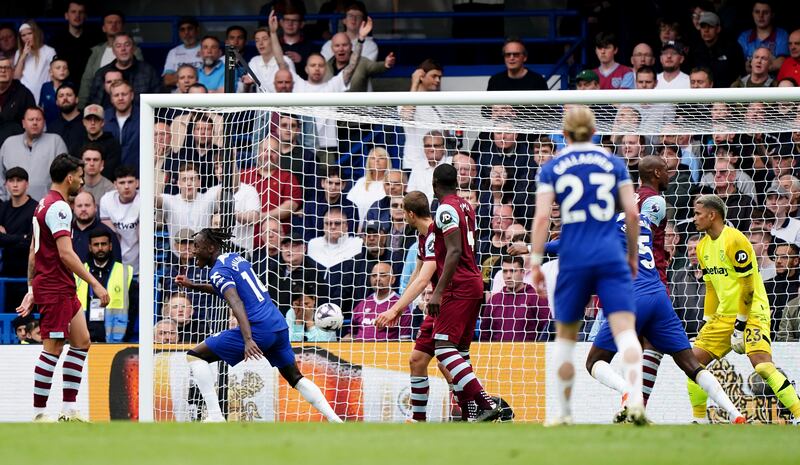 Noni Madueke (second left) celebrates scoring Chelsea’s third goal