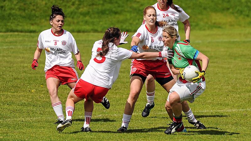 Mayo's Cora Staunton takes on the Tyrone defence during their All-Ireland Senior Championship Qualifier at Ballinamore<br />Picture: Sportsfile