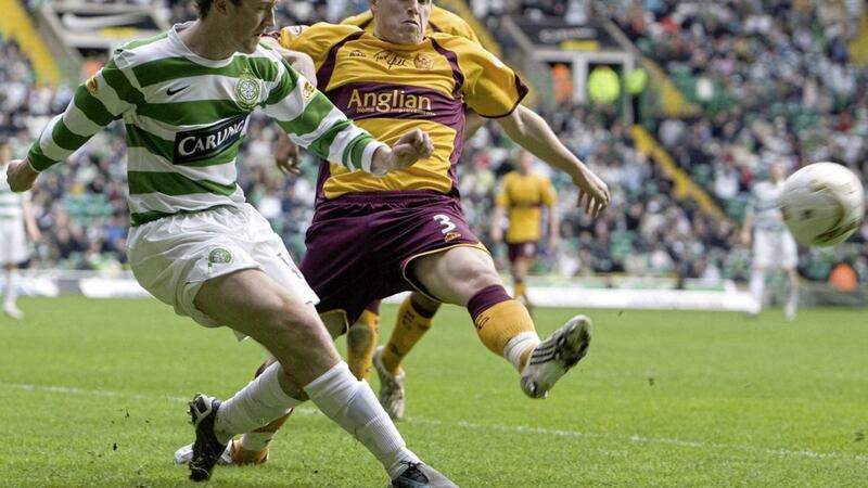 Celtic&#39;s Aiden McGeady gets his cross away despite a tackle from Motherwell&#39;s Steven Hammell during the Clydesdale Bank Scottish Premier League match at Celtic Park Glasgow on Saturday April 5 2008. Picture by Chris Clark/PA Wire. 