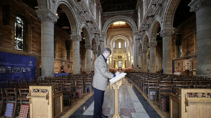 Signing a book of sympathy at St Anne&#39;s Cathedral in Belfast following the fire at Notre Dame in Paris 