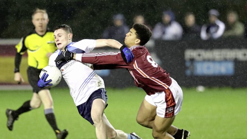 St Mary's Cormac Murphy (left) and St Paul's Zykgimantas Burnickas lock horns during last night's MacRory Cup semi-final <br />Picture by Declan Roughan