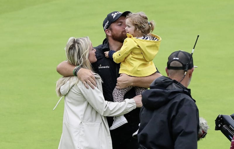 Shane Lowry celebrates winning the Claret Jug with wife Wendy Honner and daughter Iris. Picture: Niall Carson/PA Wire. 