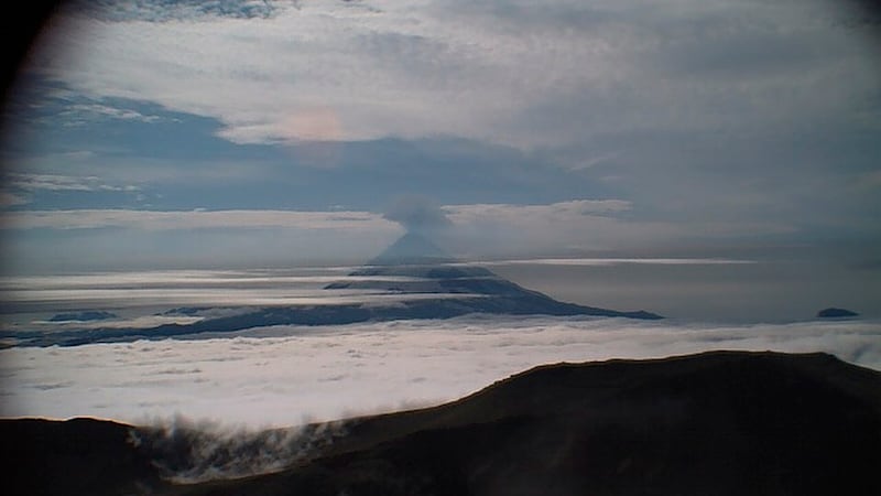 A low-level ash plume from Mount Shishaldin captured in an Alaska Volcano Observatory webcam (Matt Loewen/Alaska Volcano Observatory/US Geological Survey/AP)