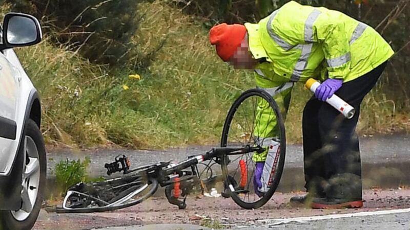 Police and forensic experts examining the scene of the fatal crash near Newtownards, which claimed the life of Stephen Lynch. Picture by Justin Kernoghan, Photopress 