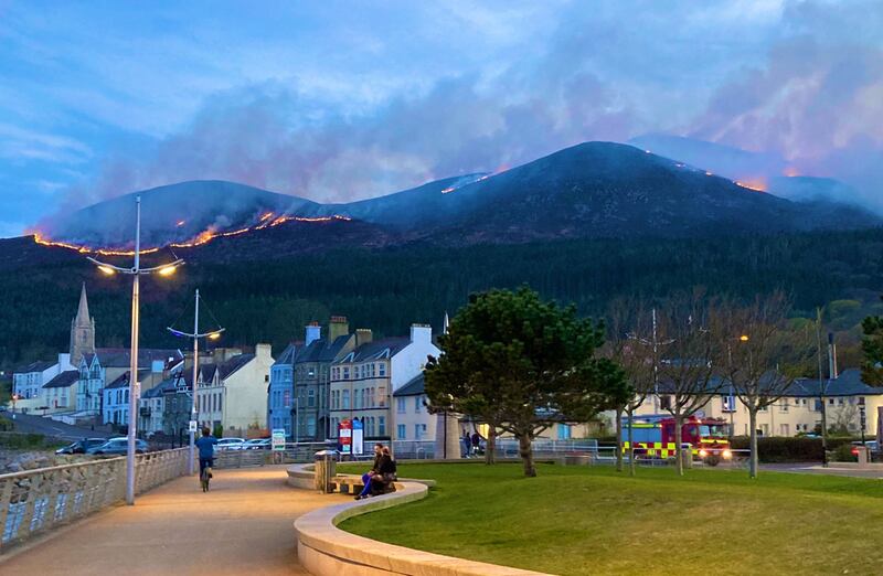 &nbsp;Photo taken with permission from the Twitter feed of @PatrickCorrigan showing a huge gorse fire spreading across the Mourne Mountains in Co Down. The fire in the Slieve Donard area has been ongoing since the early hours of Friday morning, with up to 60 firefighters and 12 appliances battling the blaze. Issue date: Saturday April 24, 2021.