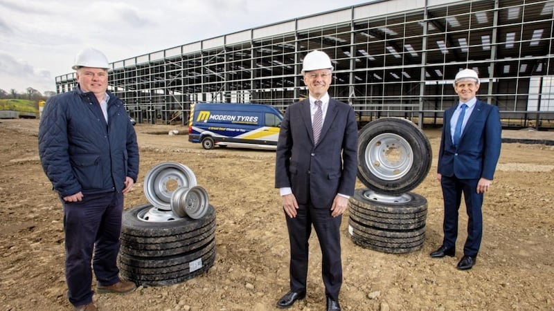 L-R: Rory Byrne, director of Modern Tyres with Invest NI chief executive Kevin Holland and James McKee, financial director of Modern Tyres. 