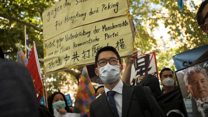 Hong Kong pro-democracy activist Nathan Law is currently living in Britain (Markus Schreiber/AP)