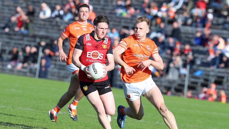 Armagh's Rian O'Neill and Down's Miceal Rooney in action during the Ulster GAA Senior Football Championship Semi- Final between Armagh and Down at St Tiernach's Park, Clones. Pic : Philip Walsh
