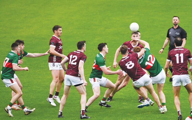 Paul Conroy of Galway and Jack Carney of Mayo compete for a throw-in during the Connacht GAA Football Senior Championship final match between Galway and Mayo at Pearse Stadium in Galway. Photo by Daire Brennan/Sportsfile