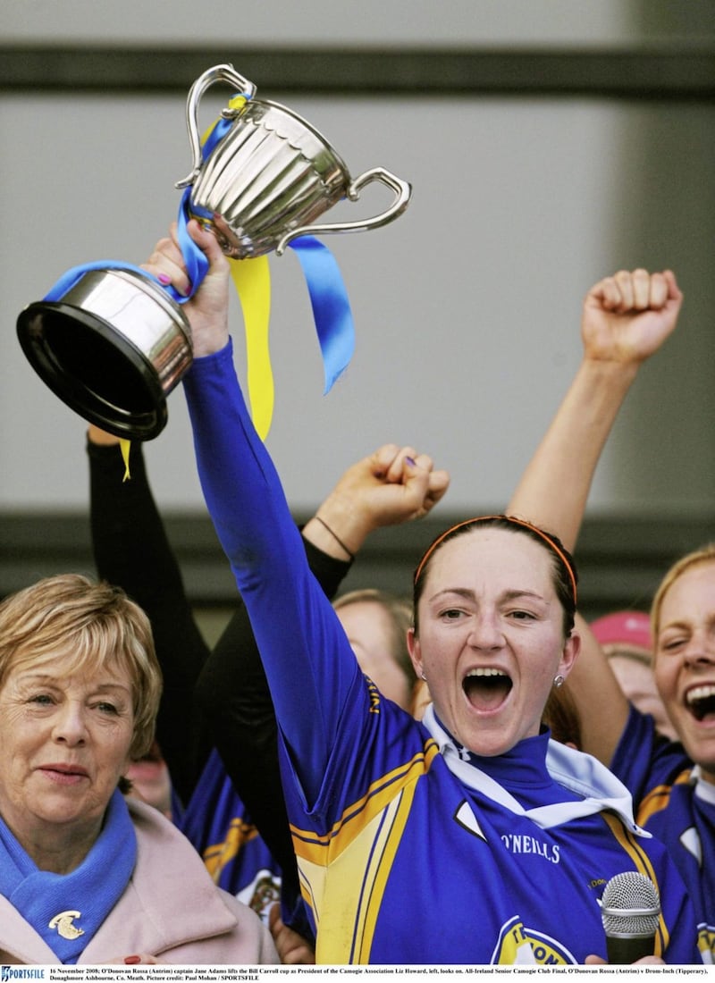 O&#39;Donovan Rossa (Antrim) captain Jane Adams lifts the Bill Carroll cup as President of the Camogie Association Liz Howard left looks after the 2008 All-Ireland Senior Camogie Club Final against Drom-Inch (Tipperary) at Donaghmore, Ashbourne Co. Meath. Picture by Paul Mohan / SPORTSFILE 