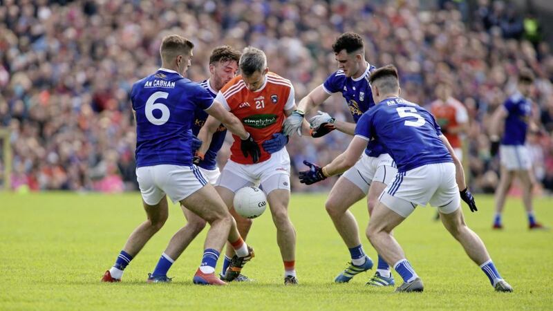 NO THROUGH ROAD: Armagh&#39;s Mark Shields is closed won by Cavan&#39;s Killian Clarke, Conor Moynagh, Gerard Smith and Conor Rehill in the Ulster Senior Football semi-final at Clones on June 2 2019. Picture by Seamus Loughran 