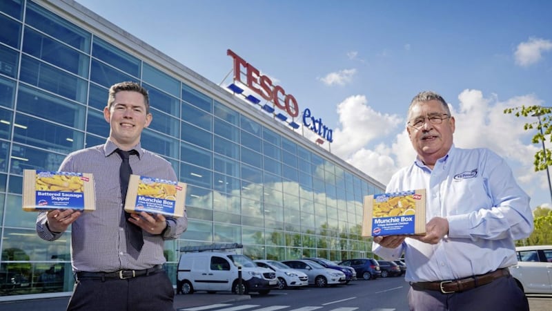 Michael Crealey, buying manager at Tesco NI and Stephen McNeice, account manager at TS Foods, mark the launch of three new Tony&rsquo;s Chippy meal-box products into 16 Tesco stores across Northern Ireland. Picture: Aaron McCracken 