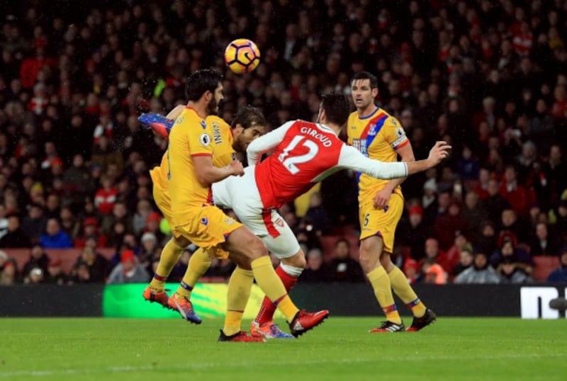Arsenal's Olivier Giroud scores the opening goal during the Premier League match at the Emirates Stadium