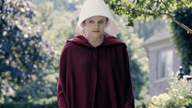 Elisabeth Moss stars as Offred, a reproductive surrogate or &#39;handmaid&#39;, in The Handmaid&#39;s Tale 