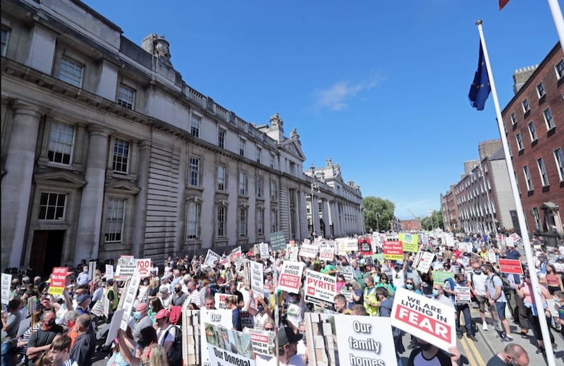 Protesters during a demonstration outside the Government Buildings in Dublin on June 15 2021 to demand a 100% redress scheme for homes and properties affected by bricks contaminated with mica. Picture by&nbsp;Niall Carson/PA Wire