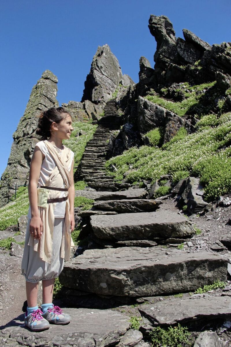 Old meets new – a girl dressed up as a Star Wars character on Skellig Michael
