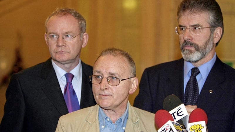 The family of Denis Donaldson (centre) - pictured in 2005 with the late Martin McGuinness and Gerry Adams - have said they are dismayed at further delays in the inquest. 