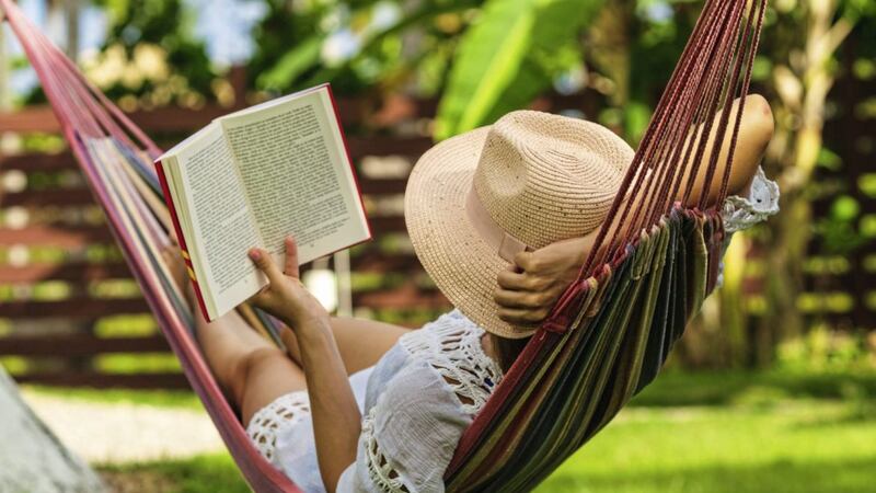 Getting into a good summer read can be an escape in itself 