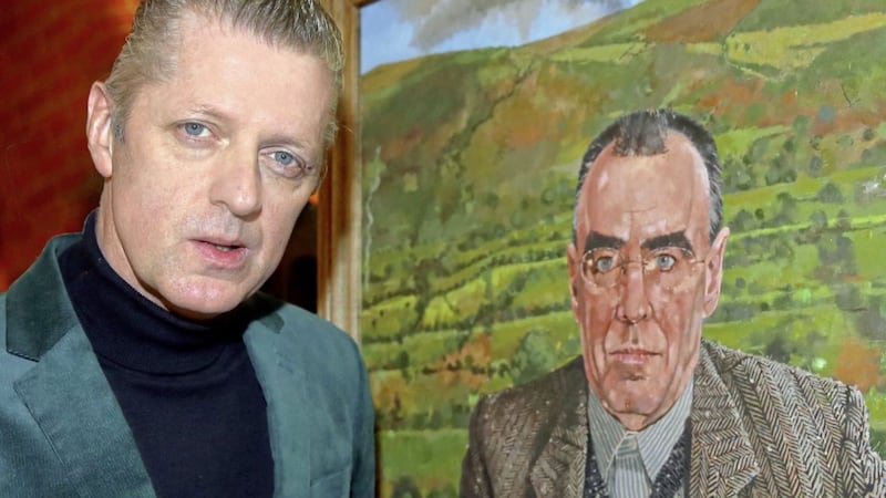 Glenn Patterson, writer an director of the Seamus Heaney Centre at Queen&#39;s, with a portrait of Belfast poet Ciaran Carson at the Lyric Theatre. Picture by Cliff Donaldson 