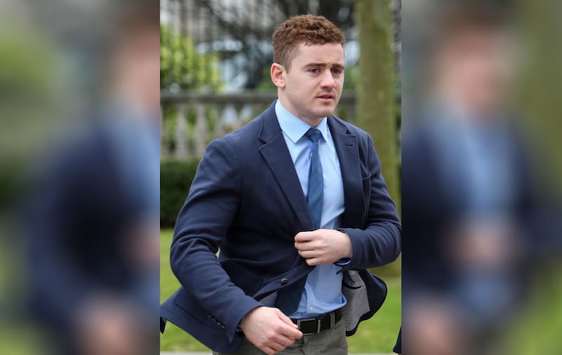 &nbsp;Paddy Jackson walking into court today. He is charged with raping a woman and sexual assault and denies both charges. Picture by Mal McCann