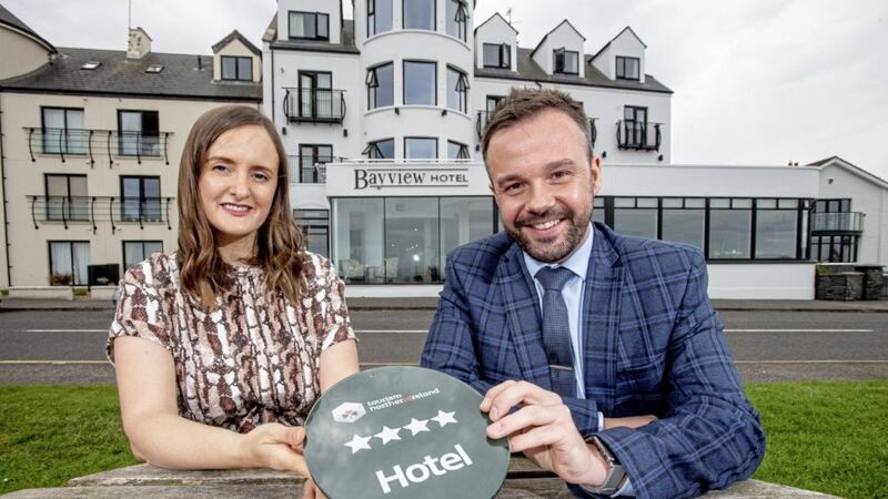 The Bayview Hotel in Portballintrae has successfully achieved a four star grading from Tourism NI following a recent &pound;350,000 revamp. Pictured at the grading announcement are Samantha Corr, Tourism NI and hotel owner, Steven Kane 