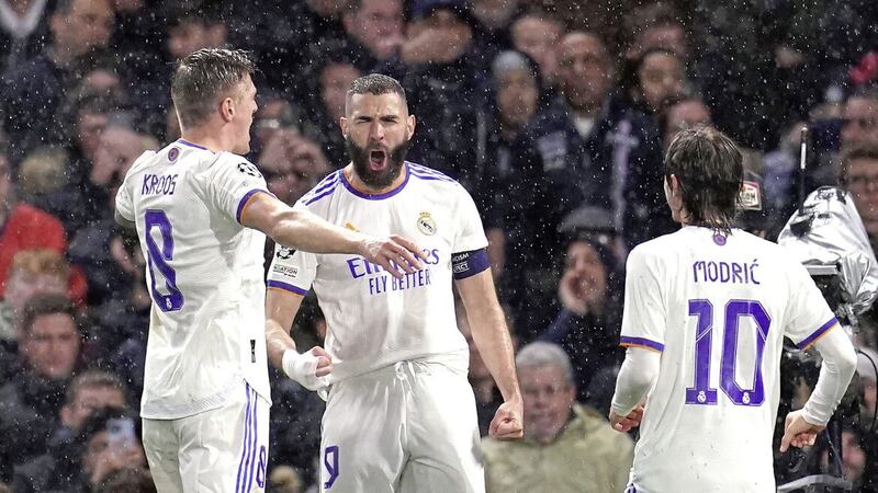 Real Madrid&#39;s Karim Benzema (centre) is now rated first among equals, (joint-)top of the Fifa 23 rankings. 