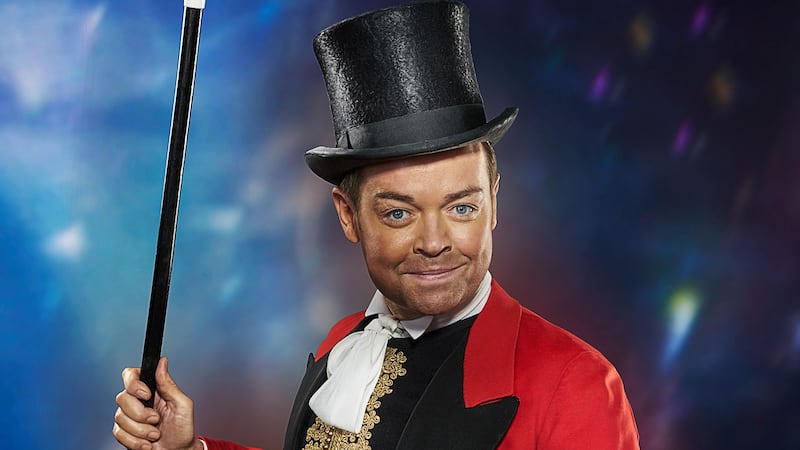 The presenter donned a top hat, waistcoat and red suit overcoat for a themed photo shoot.