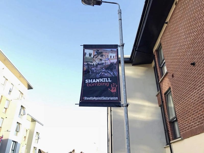 Banners have been placed in a shared housing estate in south Belfast. 