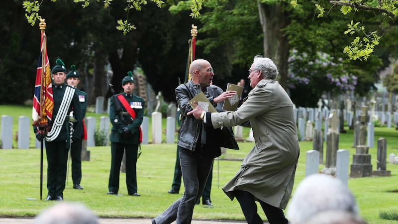 Brian Murphy is confronted by Canadian ambassador Kevin Vickers at Grangegorman cemetery 