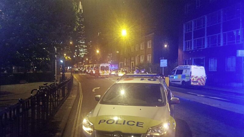 Police vehicles in a street near London Bridge during Saturday night&#39;s terrorist incidents. Picture by Dominic Harris, Press Association 