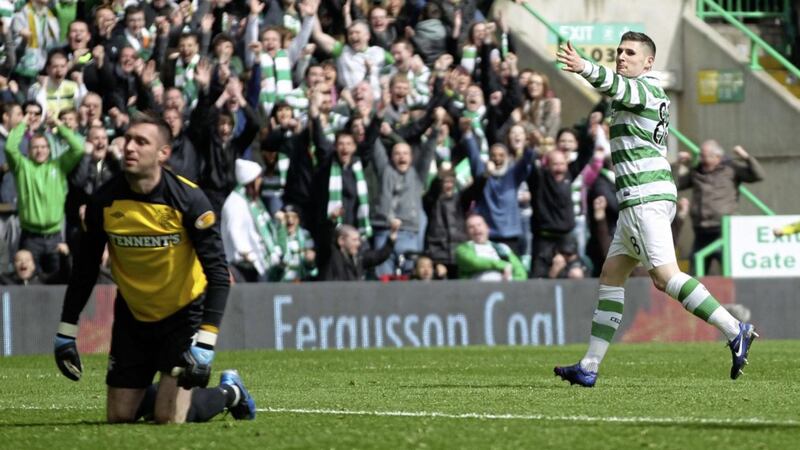 Celtic&#39;s Gary Hooper celebrates his side&#39;s third goal during the Clydesdale Bank Scottish Premier League clash against Rangers at Celtic Park, Glasgow in March 2012. 