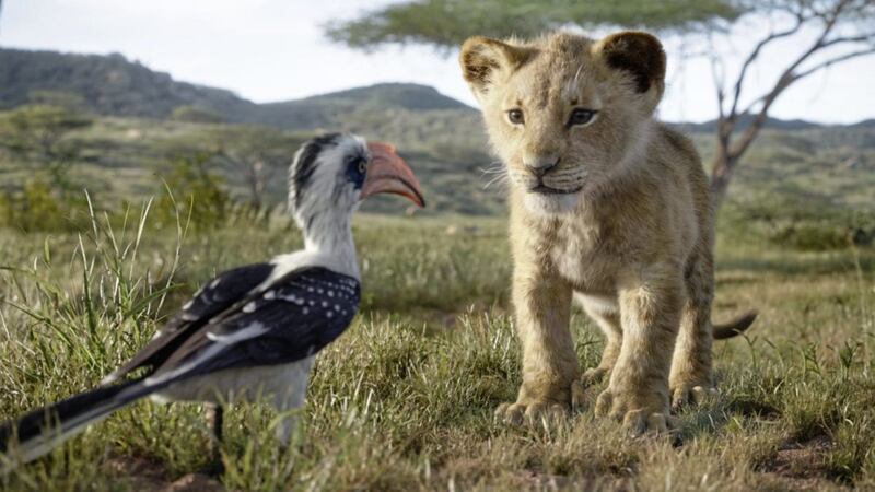 Zazu (left, voiced by John Oliver) and young Simba (JD McCrary) are back in photo-realistic form in the new remake of The Lion King 