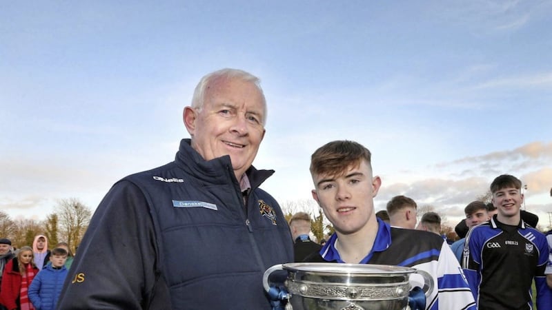 St Patrick&#39;s College, Maghera captain Adam McGonigle is presented with the cup by Jimmy Smyth from Ulster Schools after Maghera beat St Mary&#39;s, Magherafelt in the Rannafast Cup Final in 2019. Picture Margaret McLaughlin 