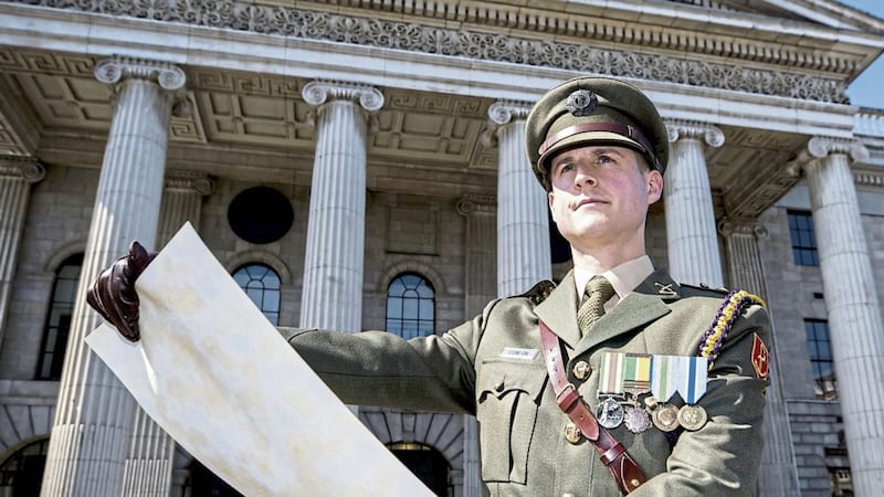 Defence Forces captain Paul Conlon poses after reading the Proclamation during the commemoration to mark the 103rd anniversary of the 1916 Easter Rising at the GPO in Dublin. Picture by Liam McBurney, Press Association