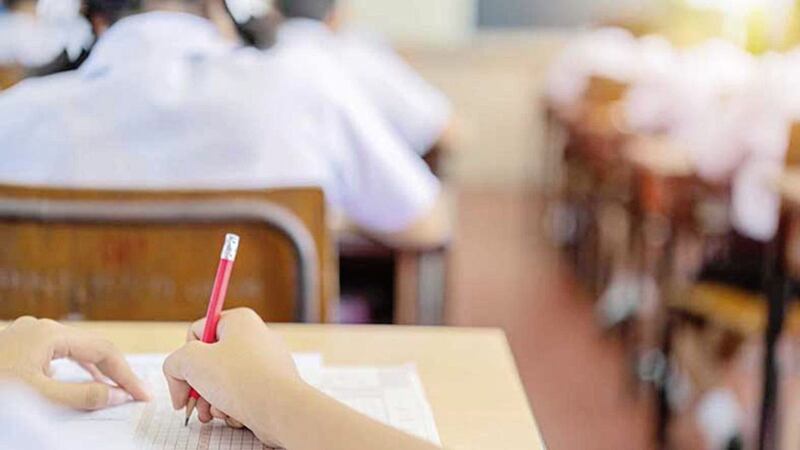 A new report has found pupils in Northern Ireland score better in most numerical and verbal tests than their counterparts in Britain 