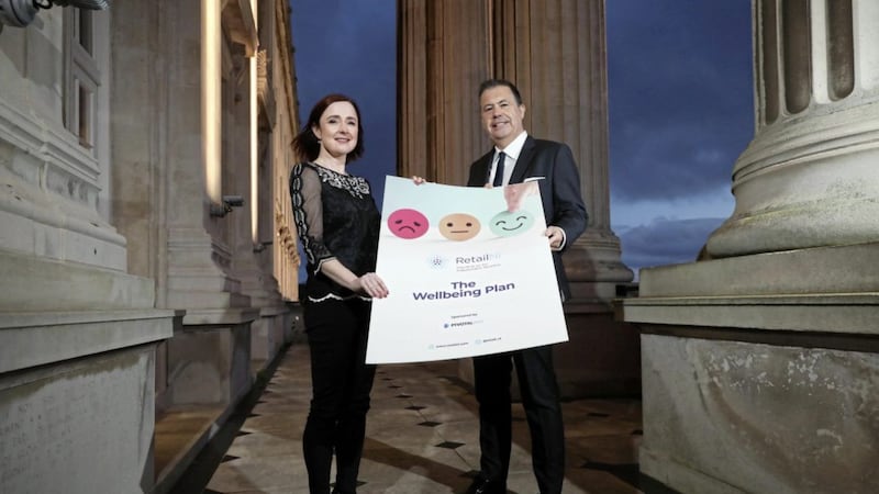 Launching the wellbeing plan at Stormont yesterday are Mental Health Champion Professor Siobhan O&rsquo;Neill with Retail NI chief executive Glyn Roberts 